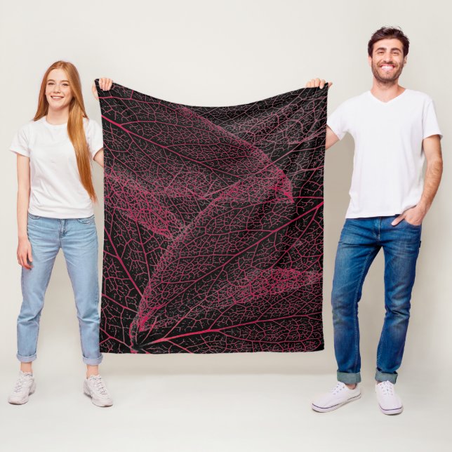 leaves in black and red fleece blanket (In Situ)