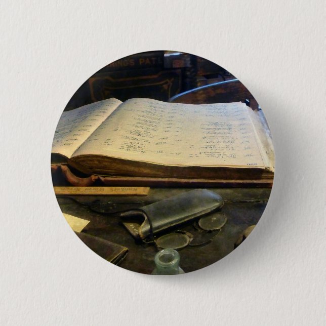 Ledger and Eyeglasses Pinback Button (Front)