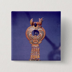 Left earring from a pair earrings with a pinback button