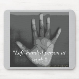 "Left-handed person at work." Mouse Pad