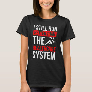 Leg Amputee Still run better than the System T-Shirt
