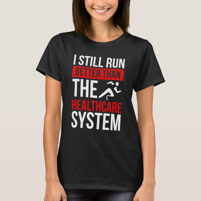 Leg Amputee Still run better than the System T-Shirt (Front)