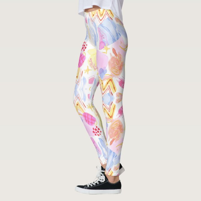 Leggings featuring a colorful abstract pattern  (Left)