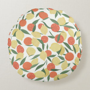Lemon and orange fruits with leaves on white backg round pillow