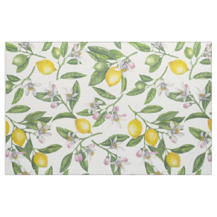Lemon branches with blossoms and fruit on white fabric