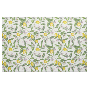 Lemon branches with blossoms and fruit on white fabric
