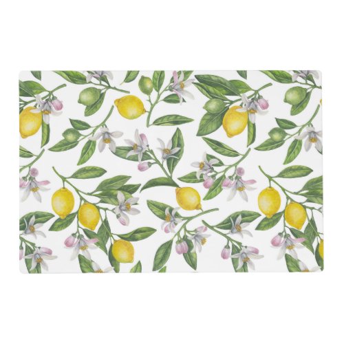 Lemon branches with blossoms and fruit on white placemat