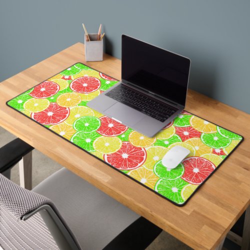 Lemon orange grapefruit and lime slices pattern desk mat