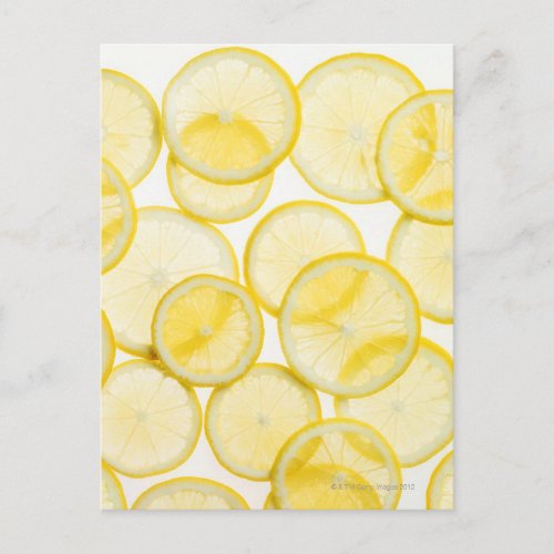 Lemon slices arranged in pattern backlit postcard