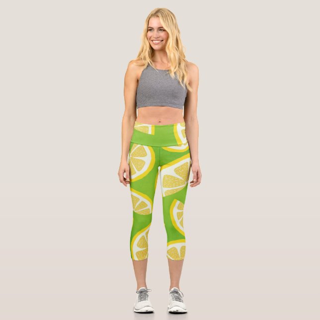 Lemon Slices on Lime Green Background Capri Leggings (Front)