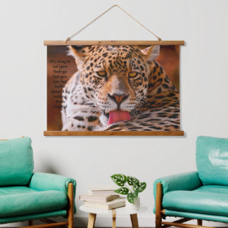 Leopard cleaning his paws hanging tapestry