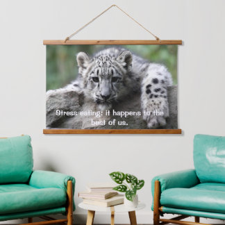 Leopard looking at you from on a rock  hanging tap tapestry