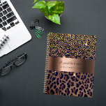Leopard pattern brown black bronze 2024 planner<br><div class="desc">Elegant, cool, glamorous and feminine with brown, golden and black leopard pattern, decorated with golden confetti. Personalize and add your name. A large faux bronze metallic looking band. Template for a year, black letters. The name is written with a modern hand lettered style script. Perfect for female Entrepreneurs, make-up artists,...</div>