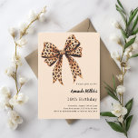 Leopard print bow brown beige birthday invitation<br><div class="desc">A soft beige background,  decorated with a large bow with leopard print.  Personalize and add a name and party details.</div>
