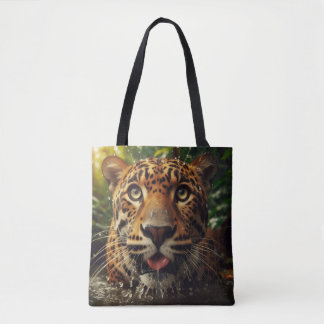 Leopard Stares While Lapping Water in Jungle Tote Bag