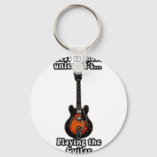 Less is more unless it's playing guitars keychain