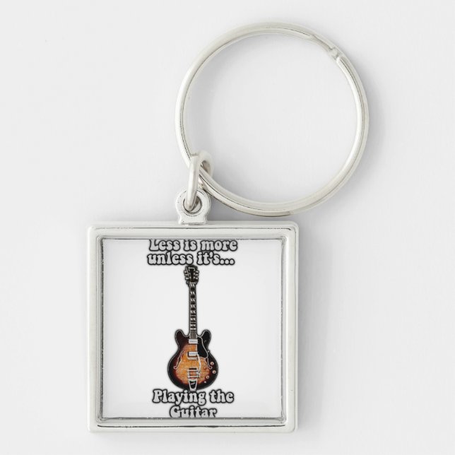 Less is more unless it's playing the guitar. brown keychain (Front)