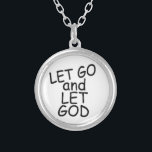 LET GO and LET GOD Necklace<br><div class="desc">Here is a perfect necklace or gift for any who believe in God. On a pink background it reads "LET GO and LET GOD". Get one now and spread God's word as he TELLS us to. Please come on in and visit my store to see more inspiring creations. However I...</div>