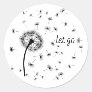 Let go, dandelion seed flowing in the wind    classic round sticker