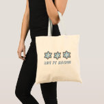 Let It Snow Blue Snowflake Winter Christmas Cookie Tote Bag<br><div class="desc">Tote bag features an original marker illustration of a delicious holiday cookie shaped like a blue snowflake. Great for Christmas or Hanukkah!

This Chanukah illustration is also available on other products. Don't see what you're looking for? Need help with customization? Contact Rebecca to have something designed just for you.</div>