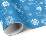 Let It Snow- Blue Wrapping Paper<br><div class="desc">Snowflakes in shades of blue and white dance over this festive wrapping paper.  Between the flakes are the words,  "Let It Snow!".  Also available in other colors.</div>