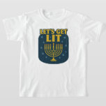 Let’s Get Lit Hanukkah Kids' T-Shirt<br><div class="desc">Shine bright this holiday with the “Let’s Get Lit” Hanukkah T-shirt, featuring a bold menorah with all candles lit under festive stars. With its vintage-style font and shimmering gold design on a deep blue background, this shirt is both fun and respectful—perfect for celebrating the Festival of Lights with family and...</div>
