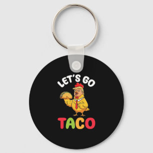 Let’s Go Taco Trump Chicken Character Holding Tast Keychain