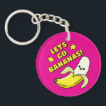 Lets Go Bananas! Keychain<br><div class="desc">Adorable keychain,  featuring a cute cartoon,  kawaii happy yellow banana with the sweetest smiles,  big round eyes and half peeled. Above him in yellow lettering with a black drop shadow reading 'Lets Go Bananas!' Two bright yellow stars are either side of the words.</div>