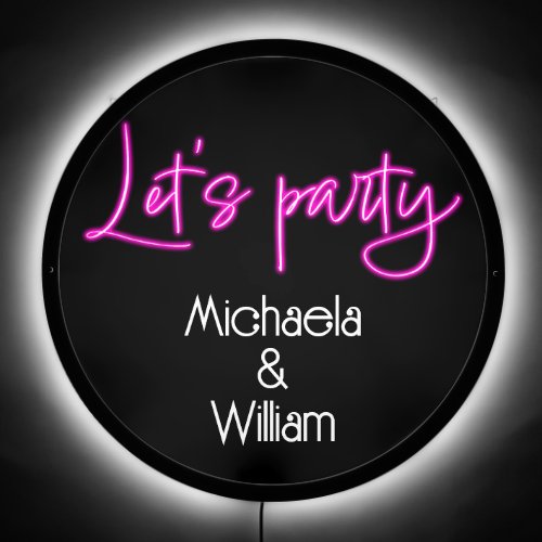 Lets party hot pink neon script couples name LED sign