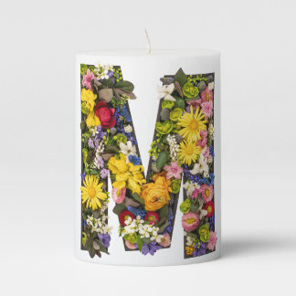 Letter m made of real natural flowers and leaves pillar candle