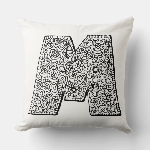 Letter M mono patterned pillow