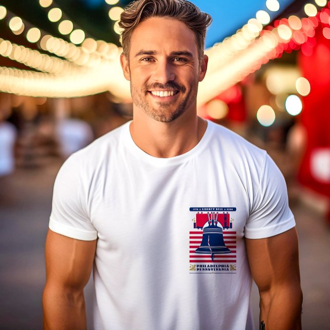 Liberty Bell Stars and Stripes Patriotic T-Shirt (A young man wears the Liberty Bell (pocket area) designed by The American Family.)