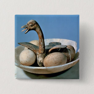 Lid of an alabaster jar decorated with a bird pinback button