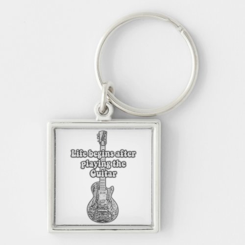 Life begins after playing the guitar black  whit keychain
