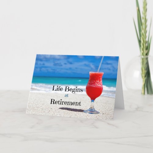Life Begins at Retirement frosty drink on beach Holiday Card