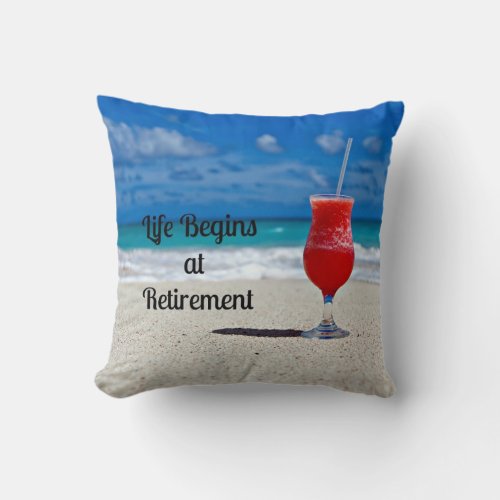 Life Begins at Retirement__Frosty Drink on Beach Throw Pillow