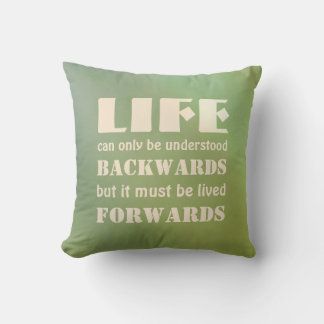 Life can only be understood backwards... throw pillow