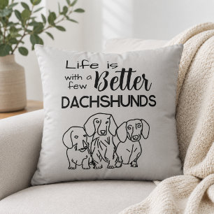 Life is better with a few Dachshunds doodle Throw Pillow