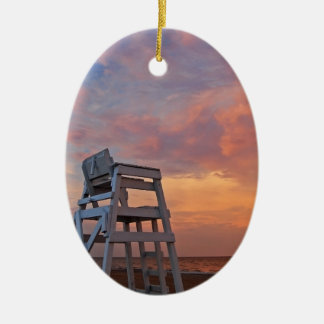 Lifeguard chair with dramatic sky. ceramic ornament