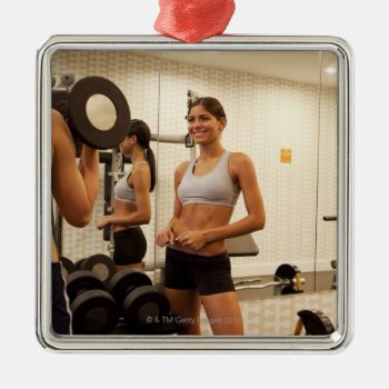 Lifting Weights In The Gym Metal Ornament by prophoto at Zazzle