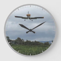 Light Aircraft Coming in to Land. Large Clock