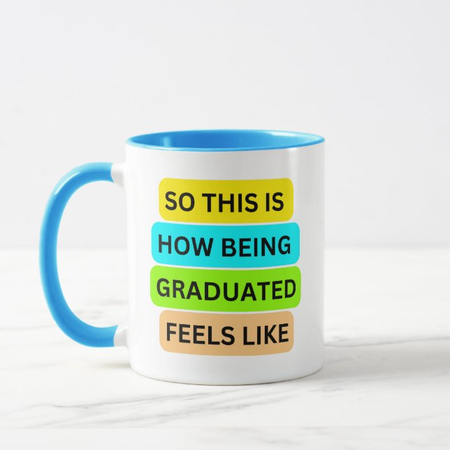 Light blue combo mug SO_THIS_IS_HOW_BEING_GRADUATE (Left)