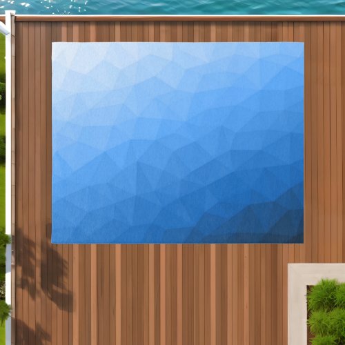 Light blue gradient geometric mesh pattern outdoor rug