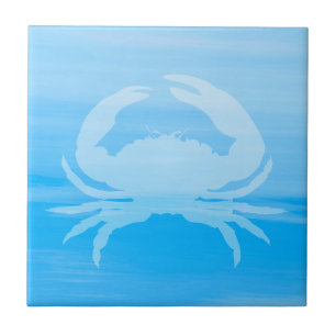Light blue sea water with crab tile