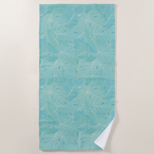 Light blue tropical palm leaves pattern beach towel