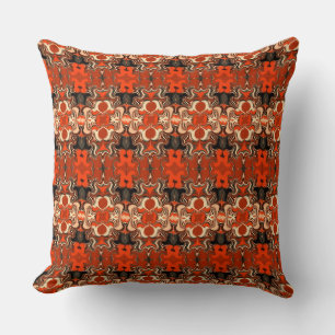 Light brown strokes, repeated image, upon red throw pillow