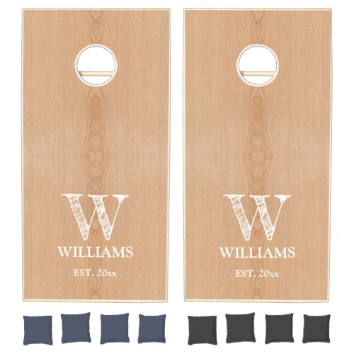 Light brown wood grain Family Monogram Cornhole Set