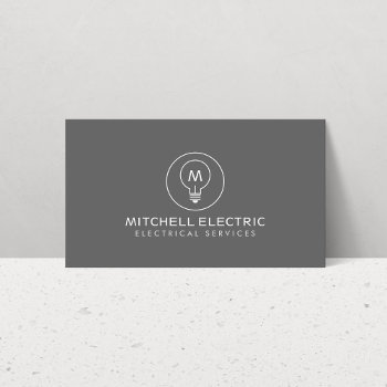 Light Bulb Monogram Logo On Gray For Electricans Business Card by 1201am at Zazzle