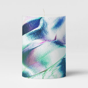 Light carved from matte metal, green to blue color pillar candle