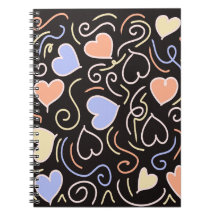 Light colored hearts on a black background noteboo